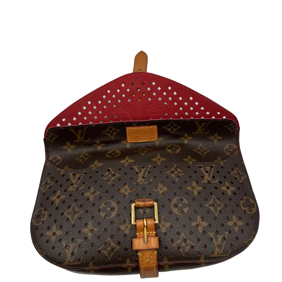 Louis Vuitton pochette Saumur Flore in canvas monogram traforato e finiture in vacchetta naturale, di lusso, originale, ottime condizioni.