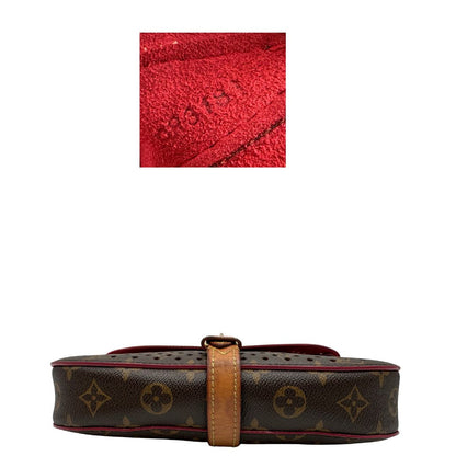 Louis Vuitton pochette Saumur Flore in canvas monogram traforato e finiture in vacchetta naturale, di lusso, originale, ottime condizioni.