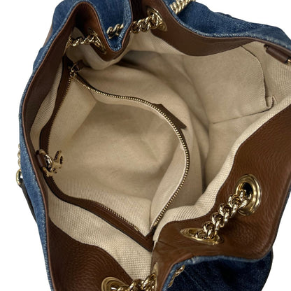 interno Borsa Gucci in tessuto blu denim e finiture in pelle a contrasto marrone; indossabile a spalla 