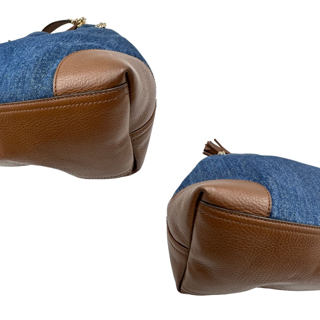 angoliBorsa Gucci in tessuto blu denim e finiture in pelle a contrasto marrone; indossabile a spalla 