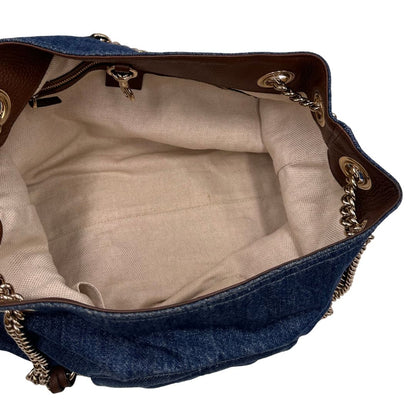 interno Borsa Gucci in tessuto blu denim e finiture in pelle a contrasto marrone; indossabile a spalla 