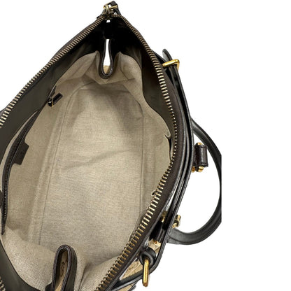 interno Borsa Gucci realizzata in tessuto GG e finiture in pelle color testa di moro, di lusso, originale, ottime condizioni, usata. 