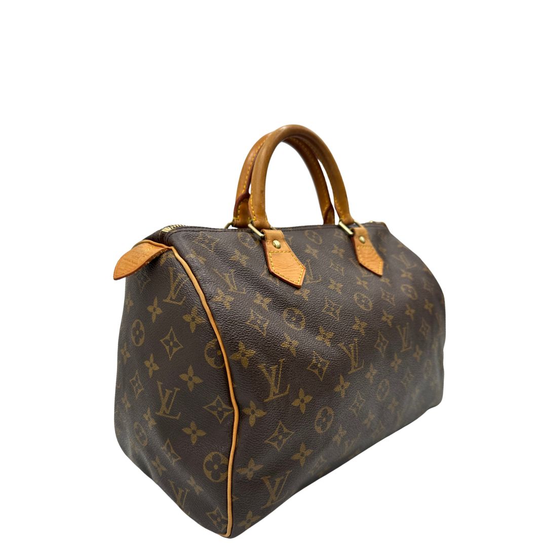 lato Bauletto Speedy 30 LV in canvas marrone monogram, di lusso, originale, ottime condizioni, usata. 
