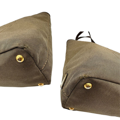  Borsa Prada in tessuto Jacquard munita di doppi manici in pelle marrone, di lusso, originale, ottime condizioni, usata.