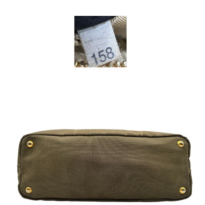  Borsa Prada in tessuto Jacquard munita di doppi manici in pelle marrone, di lusso, originale, ottime condizioni, usata.