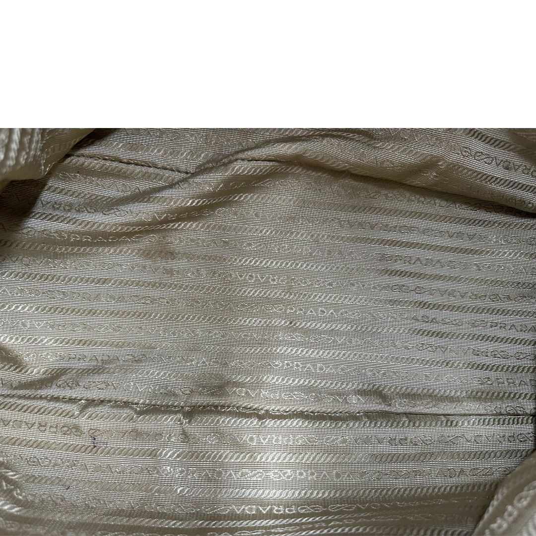  Borsa Prada in tessuto Jacquard munita di doppi manici in pelle marrone, di lusso, originale, ottime condizioni, usata.