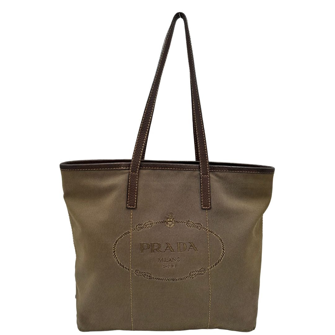  Borsa Prada in tessuto Jacquard munita di doppi manici in pelle marrone, di lusso, originale, ottime condizioni, usata.
