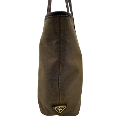  Borsa Prada in tessuto Jacquard munita di doppi manici in pelle marrone, di lusso, originale, ottime condizioni, usata.