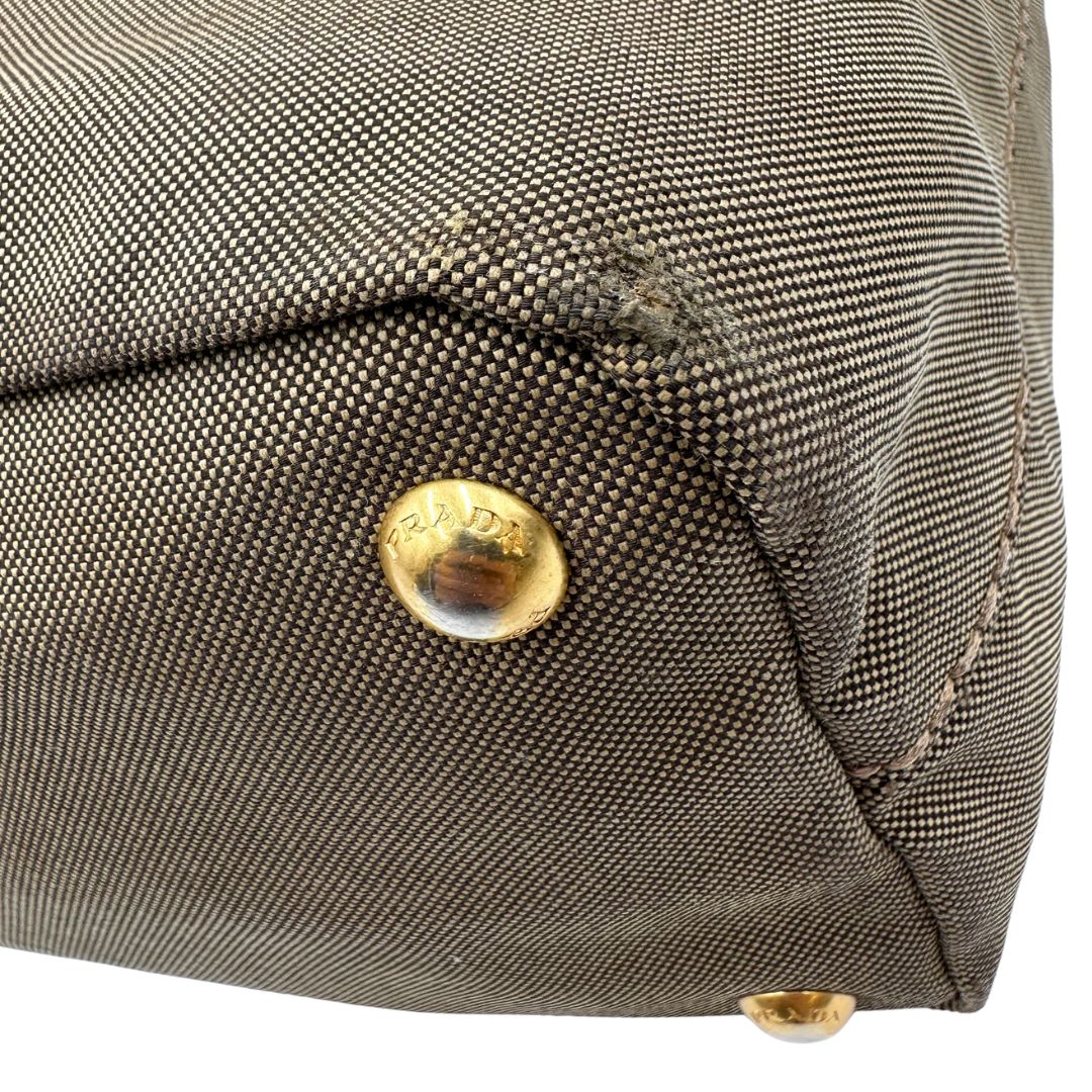  Borsa Prada in tessuto Jacquard munita di doppi manici in pelle marrone, di lusso, originale, ottime condizioni, usata.