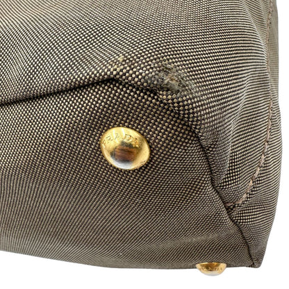 Borsa Prada in tessuto Jacquard munita di doppi manici in pelle marrone, di lusso, originale, ottime condizioni, usata.