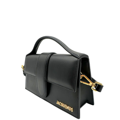 Laterale Borsa Jacquemus in pelle nera con hardware dorato, indossabile a mano o a tracolla, di lusso, originale, ottime condizioni, usata.