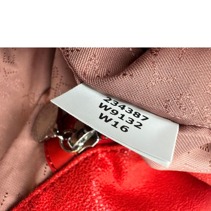 Borsa Falabella nella versione fold over tote in shaggy dear rosso e hardware argentato, di lusso, originale, ottime condizioni.