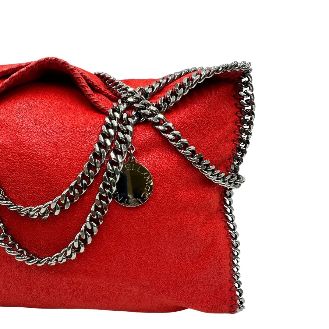 Borsa Falabella nella versione fold over tote in shaggy dear rosso e hardware argentato, di lusso, originale, ottime condizioni.