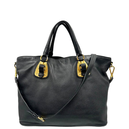 retro  Borsa Prada in pelle nera, indossabile a mano e anche a tracolla, di lusso, originale, ottime condizioni, usata. 