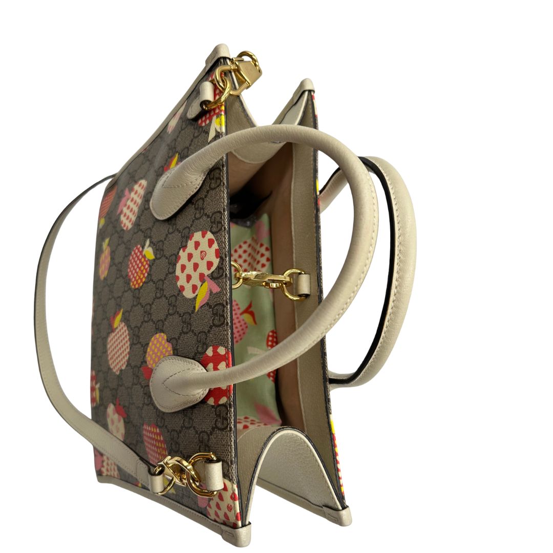 manici  Borsa Gucci in canvas GG e finiture in pelle color bianco avorio, di lusso, originale, ottime condizioni, usata. 