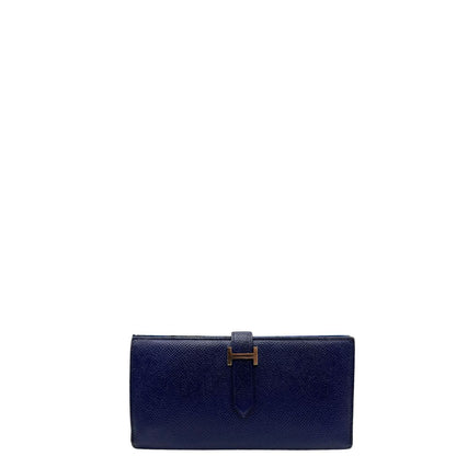 front  Portafoglio Hermès in pelle blu con iconica chiusura ad ''H'', di lusso, originale, ottime condizioni, usato. 