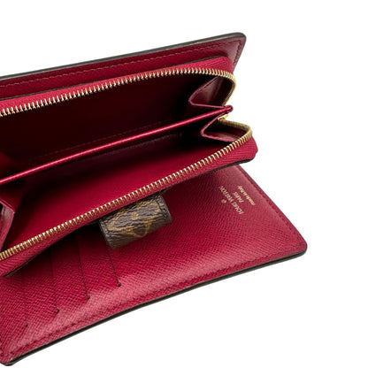  Portafoglio Louis Vuitton Juliette in canvas marrone monogram con finiture in pelle rosso amaranto, di lusso, originale, eccellenti condizioni, usato.