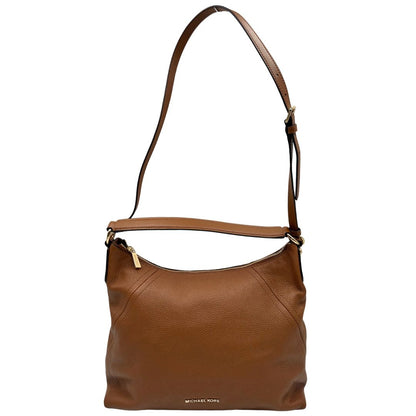 Borsa Michael Kors in pelle martellata color cammello e hardware dorato, di lusso, originale, ottime condizioni, usata.