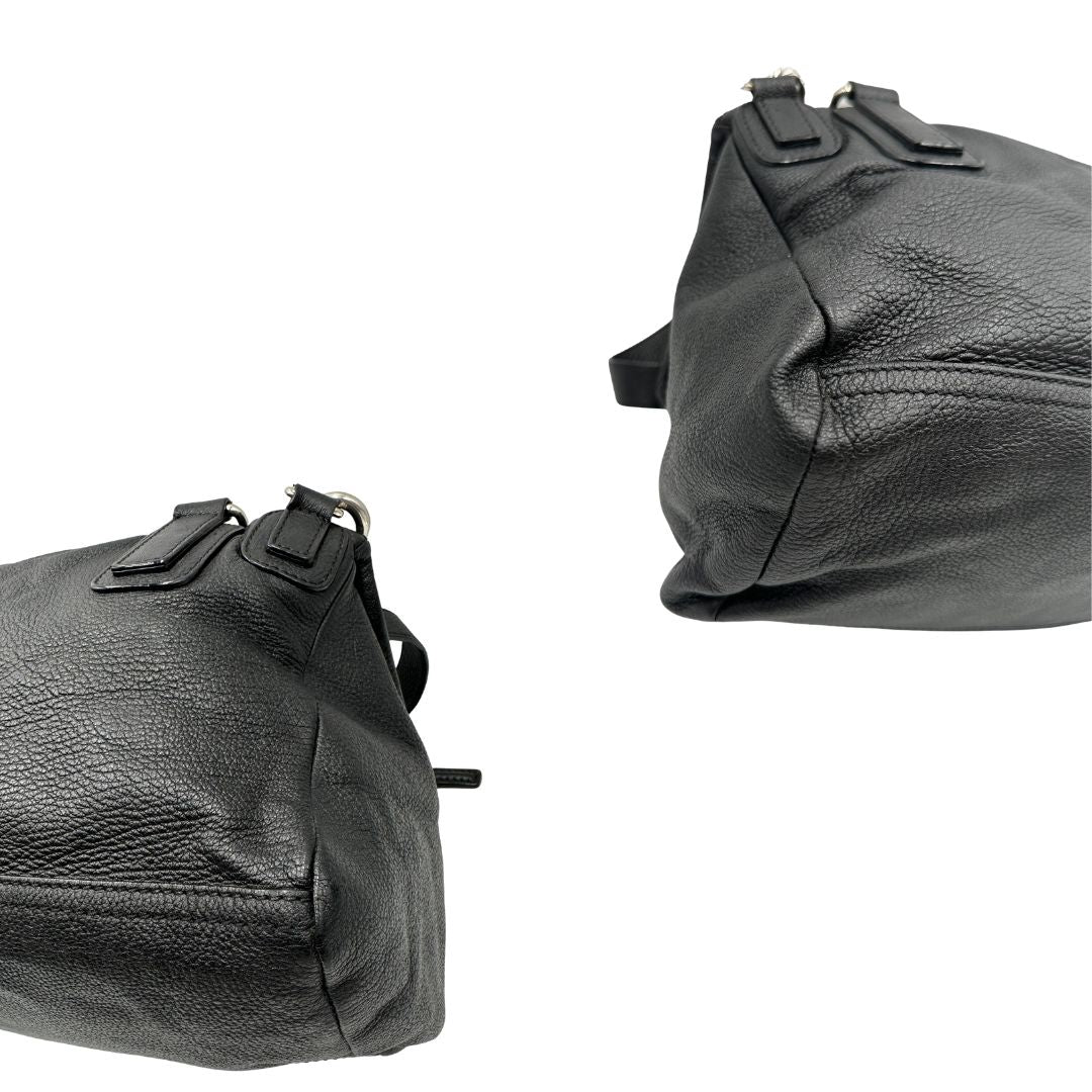 Angoli, Compatta borsa Givenchy in pelle martellata nera con hardware argentato, munita di un manico stondato e una tracolla amovibile. Originale, usata, di lusso, in ottime condizioni.