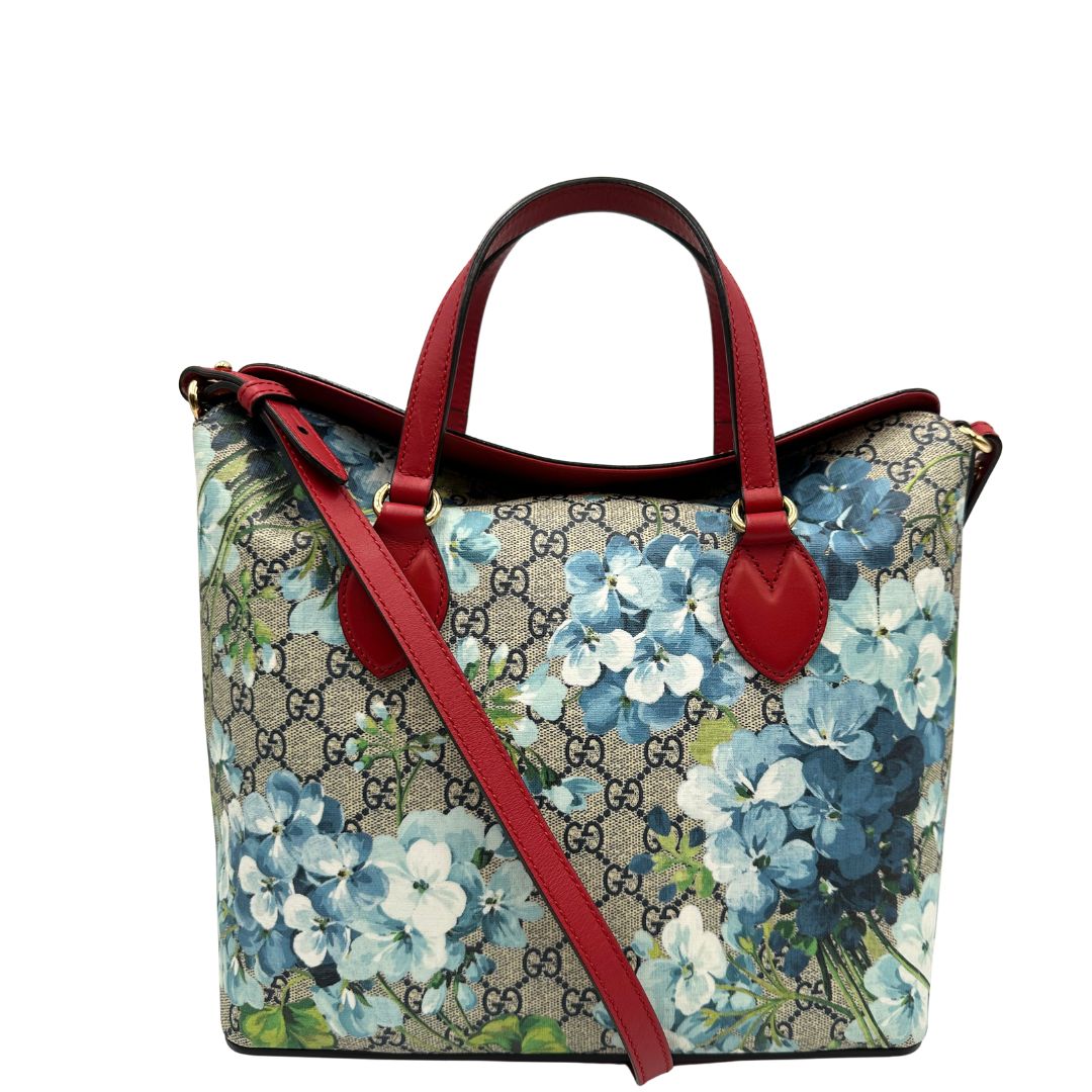 front Borsa Gucci in canvas GG con trama floreale e finiture in pelle rossa, di lusso, originale, ottime condizioni, usata. 