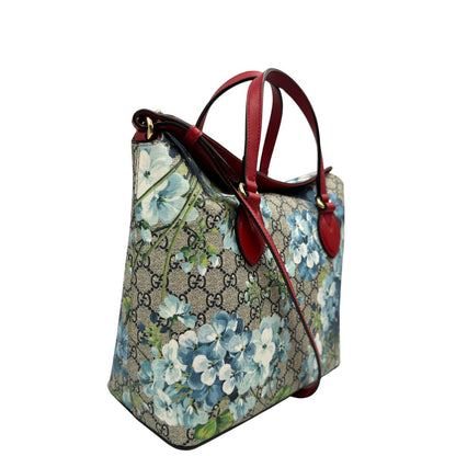 lato Borsa Gucci in canvas GG con trama floreale e finiture in pelle rossa, di lusso, originale, ottime condizioni, usata. 