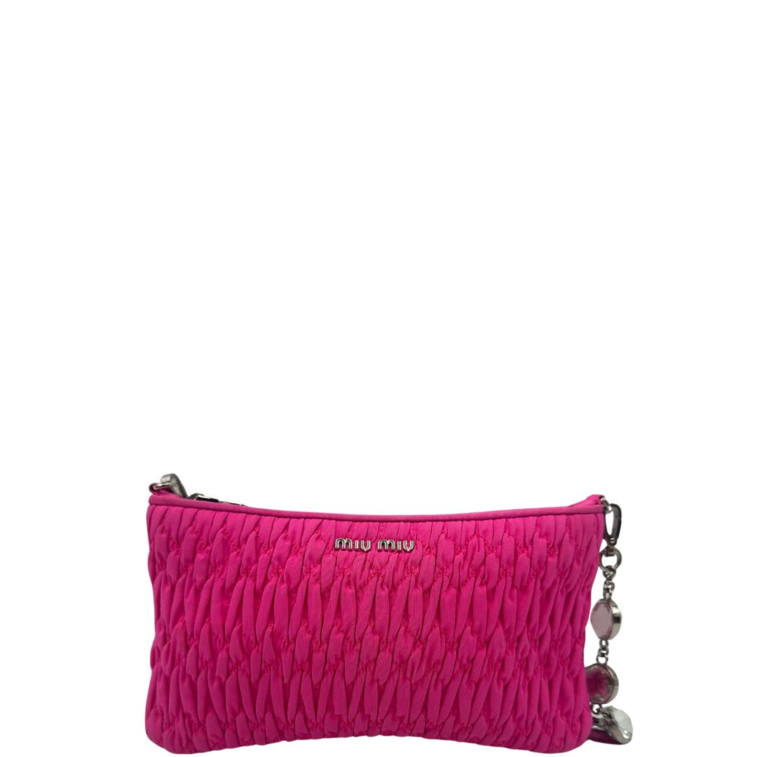 front Borsa Miu Miu in faille crystal pink, munita di una tracolla impreziosita da strass, di lusso, originale, ottime condizioni, usata. 