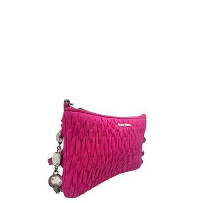 Borsa Miu Miu in faille crystal pink, munita di una tracolla impreziosita da strass, di lusso, originale, ottime condizioni, usata.