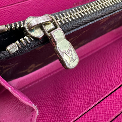 Portafoglio LV Clemence Limited Edition in canvas monogram impreziosito da charm floreale, di lusso, originale.