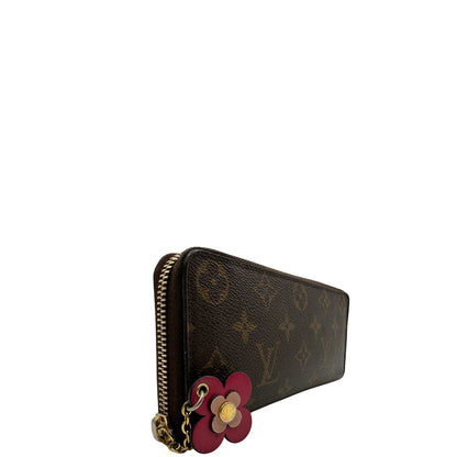 Portafoglio LV Clemence Limited Edition in canvas monogram impreziosito da charm floreale, di lusso, originale.