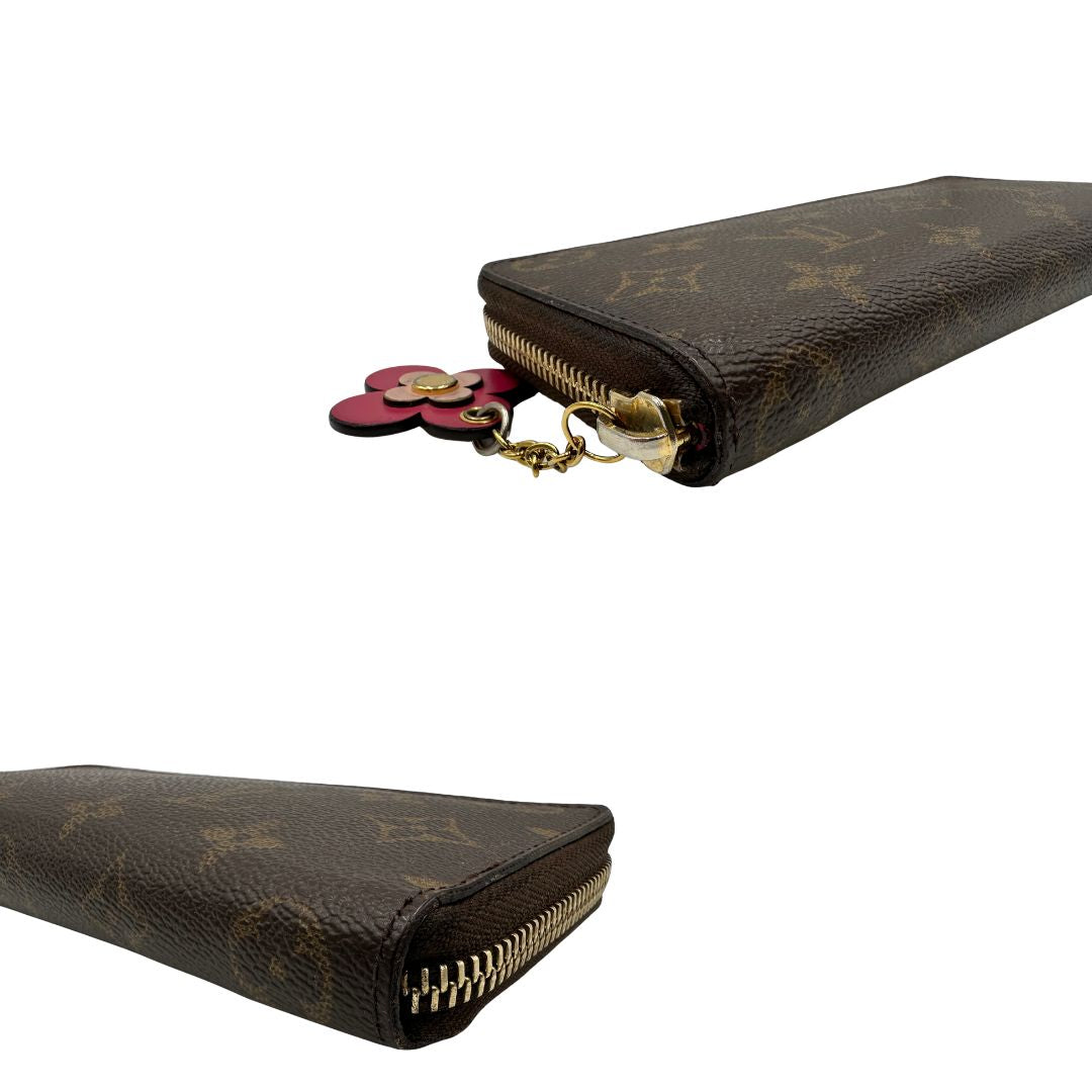 Portafoglio LV Clemence Limited Edition in canvas monogram impreziosito da charm floreale, di lusso, originale.