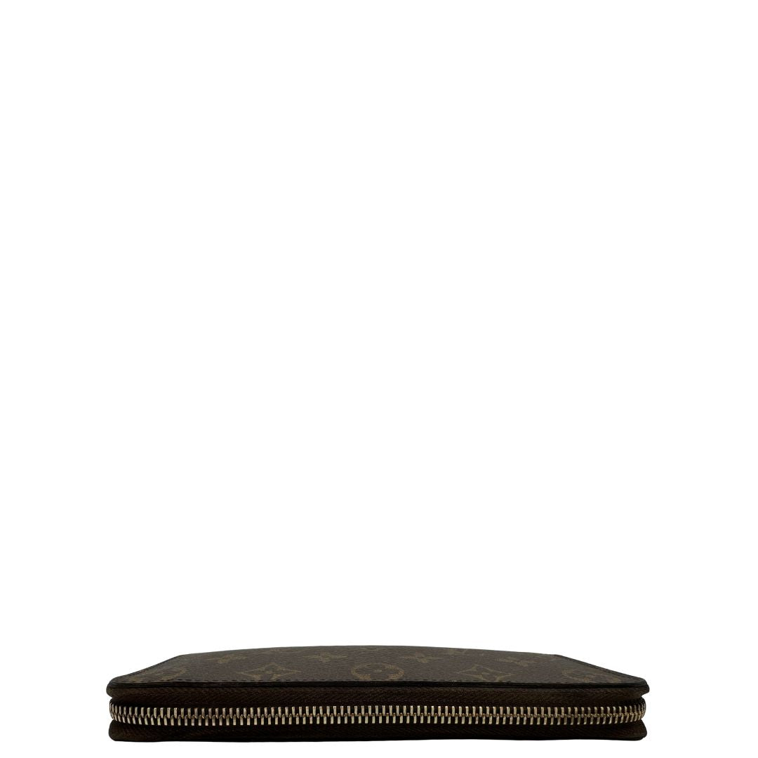 Portafoglio LV Clemence Limited Edition in canvas monogram impreziosito da charm floreale, di lusso, originale.