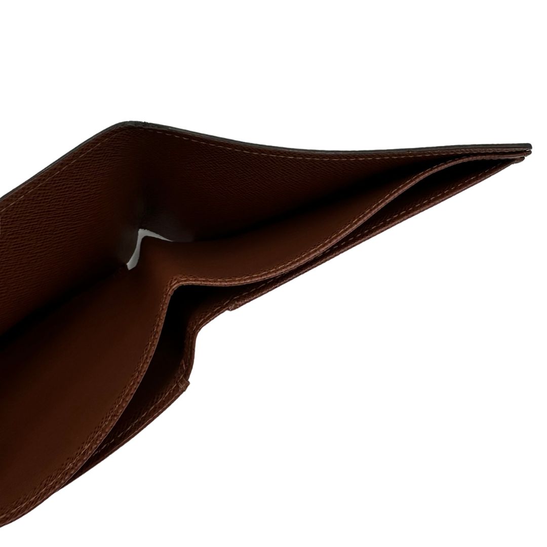 Portafoglio LV in canvas marrone monogram, di lusso, originale, ottime condizioni, usata.