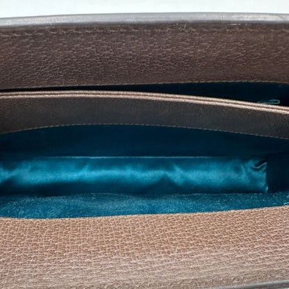 Interno,  Borsa Gucci Ophidia GG beige con finiture in pelle marrone, con iconica striscia Web verde e rossa sul front. Indossabile a tracolla. Originale, usata, di lusso, in ottime condizioni.