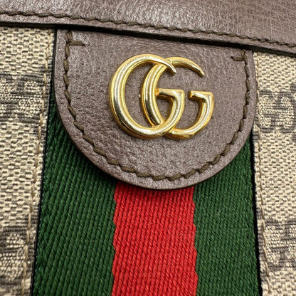 Front, Borsa Gucci Ophidia GG beige con finiture in pelle marrone, con iconica striscia Web verde e rossa sul front. Indossabile a tracolla. Originale, usata, di lusso, in ottime condizioni.