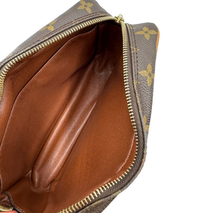 interno Pochette Compiègne Louis Vuitton in canvas marrone monogram con parti metalliche dorate, di lusso, originale, ottime condizioni, usata. 