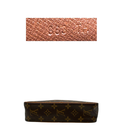 base Pochette Compiègne Louis Vuitton in canvas marrone monogram con parti metalliche dorate, di lusso, originale, ottime condizioni, usata. 