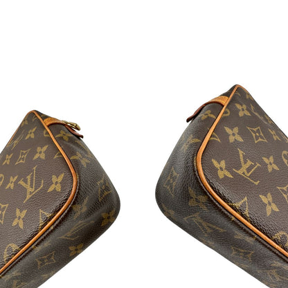 angoli Pochette Compiègne Louis Vuitton in canvas marrone monogram con parti metalliche dorate, di lusso, originale, ottime condizioni, usata. 
