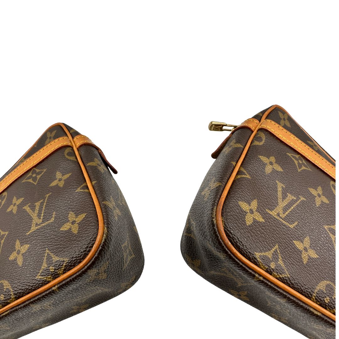 angoli Pochette Compiègne Louis Vuitton in canvas marrone monogram con parti metalliche dorate, di lusso, originale, ottime condizioni, usata. 