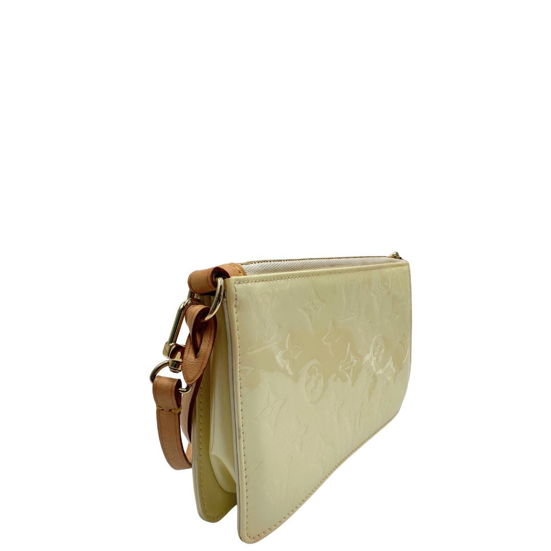 lato Pochette LV Lexington in pelle vernis monogram color crema, di lusso, originale, ottime condizioni 