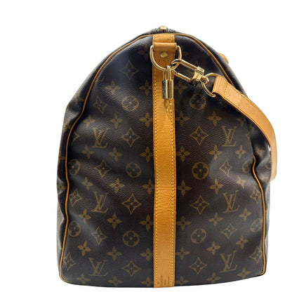 lato  Borsone Louis Vuitton Keepall nella misura 60 in canvas marrone monogram e finiture in vacchetta naturale, di lusso, originale, ottime condizioni, usato. 