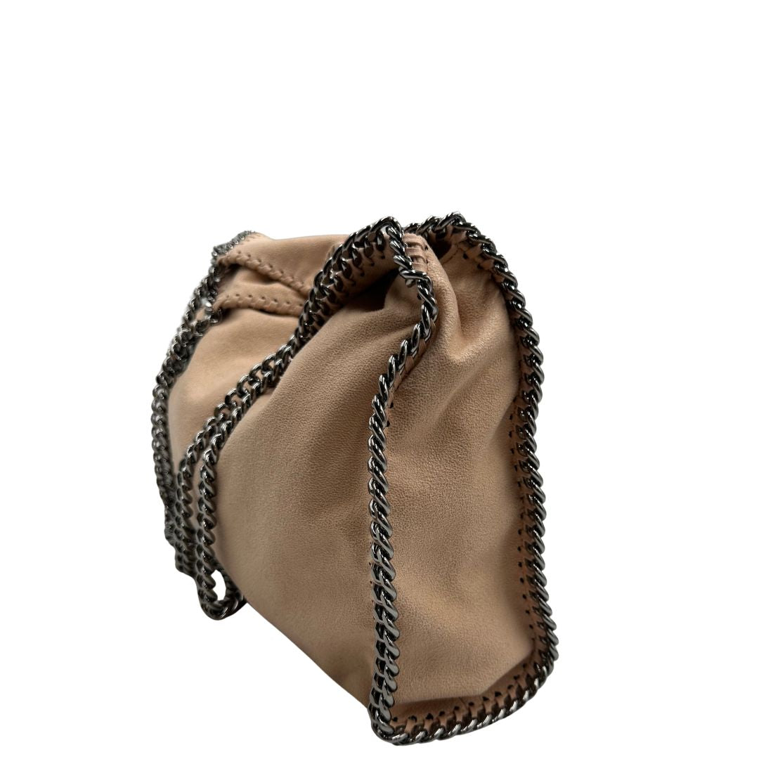 lato  Borsa Falabella nella versione fold over tote color rosa cipria, di lusso, originale, ottime condizioni, usata 