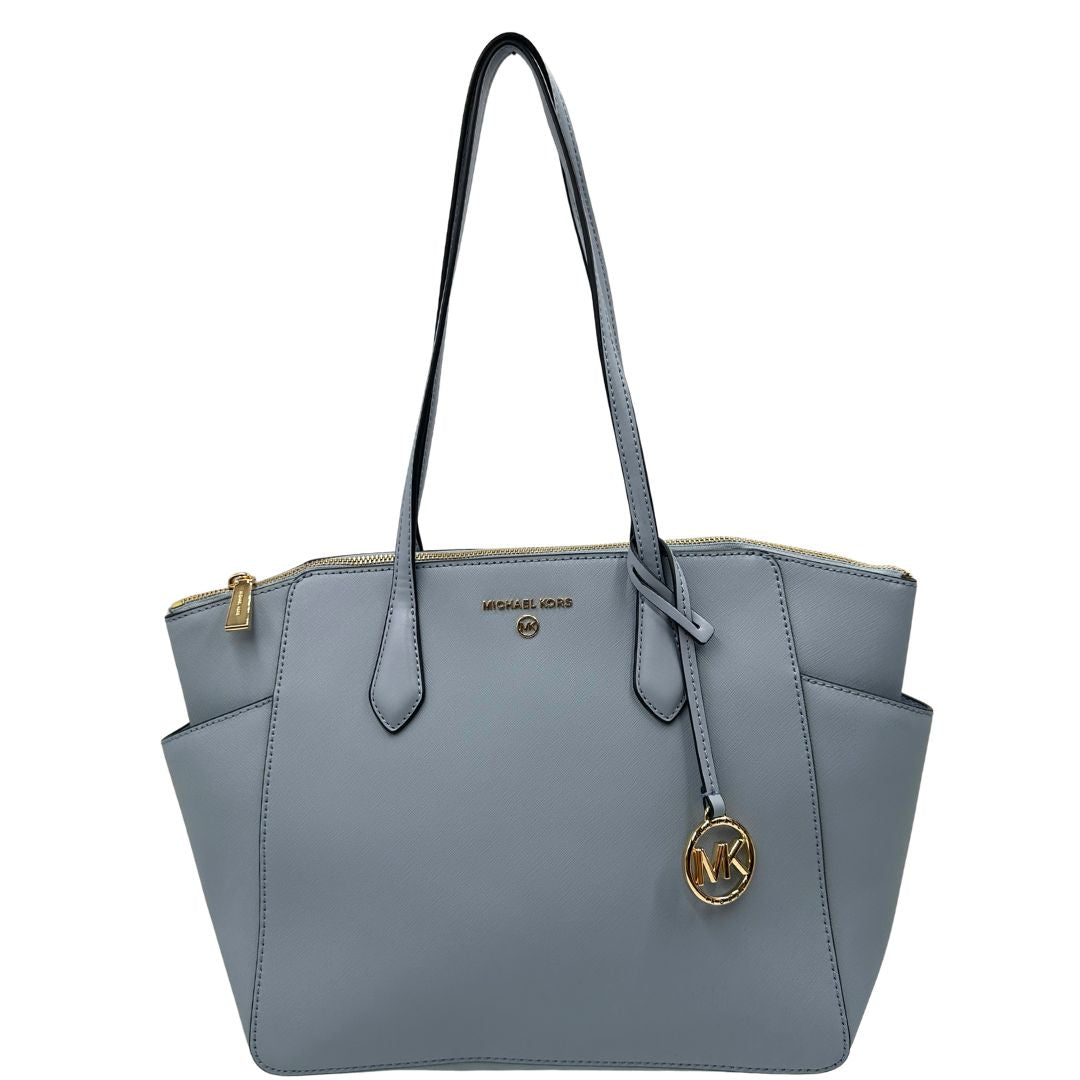 front  Borsa MK in pelle saffiano celeste, munita di doppi manici, indossabile a spalla, di lusso, originale, ottime condizioni.