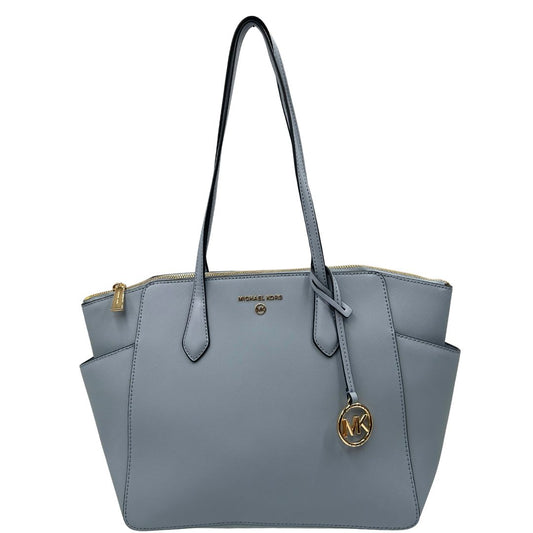front  Borsa MK in pelle saffiano celeste, munita di doppi manici, indossabile a spalla, di lusso, originale, ottime condizioni.