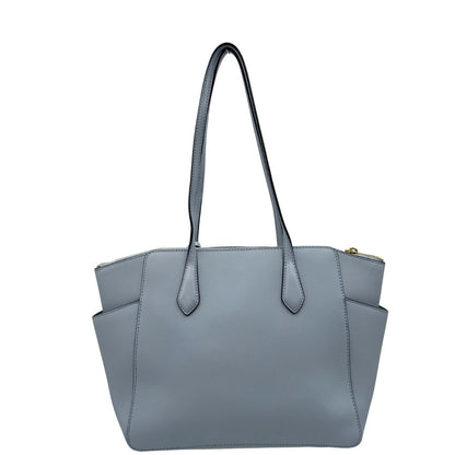 retro  Borsa MK in pelle saffiano celeste, munita di doppi manici, indossabile a spalla, di lusso, originale, ottime condizioni. 