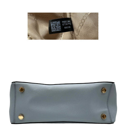 base  Borsa MK in pelle saffiano celeste, munita di doppi manici, indossabile a spalla, di lusso, originale, ottime condizioni. 