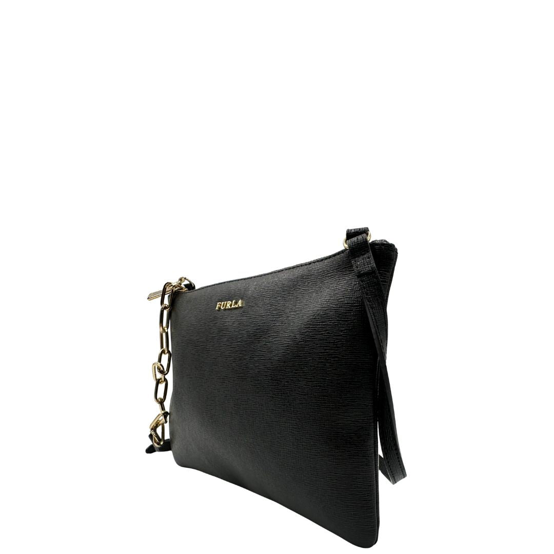 lato  Borsa Furla in pelle nera, munita di una tracolla regolabile, di lusso, originale, ottime condizioni, usata
