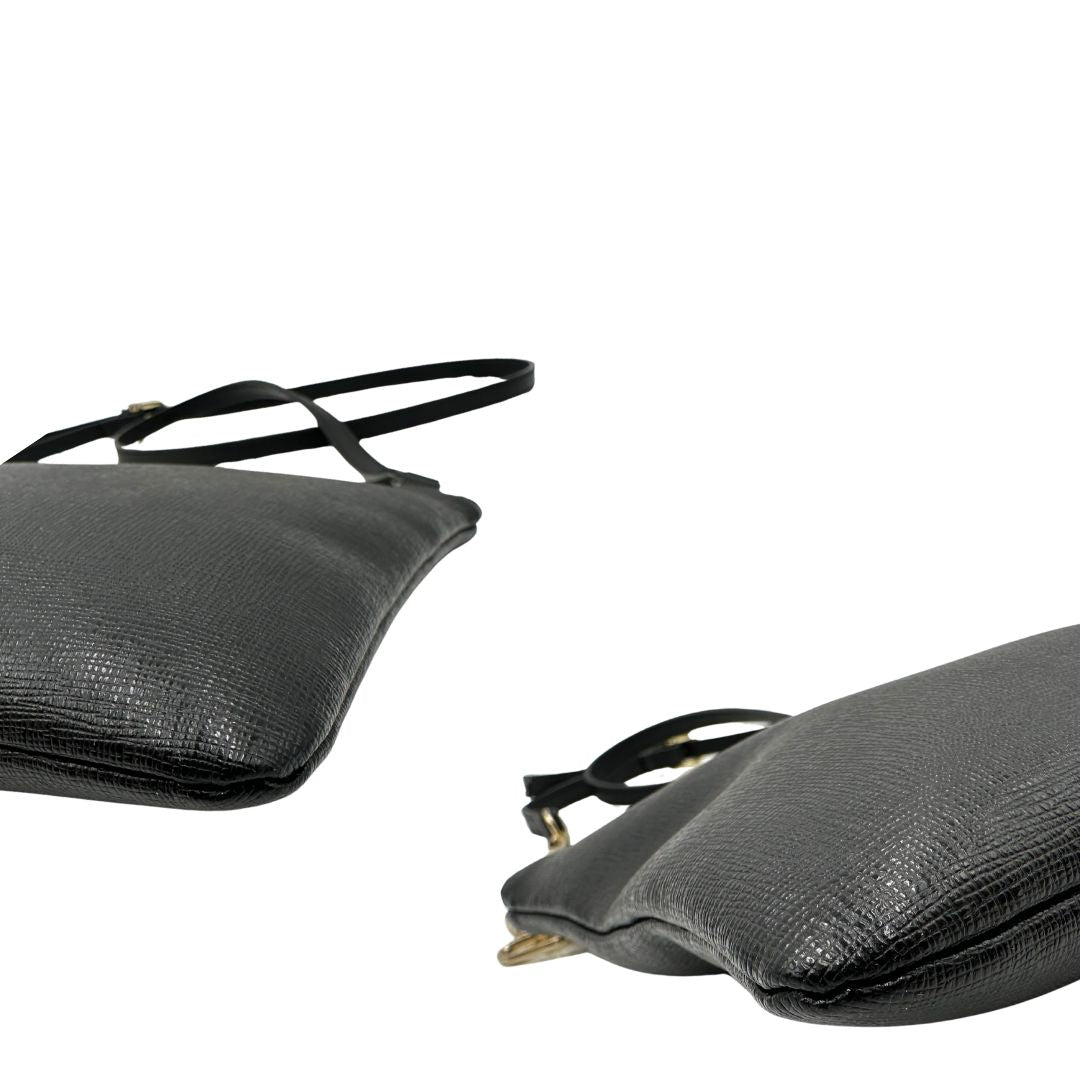 angoli  Borsa Furla in pelle nera, munita di una tracolla regolabile, di lusso, originale, ottime condizioni, usata