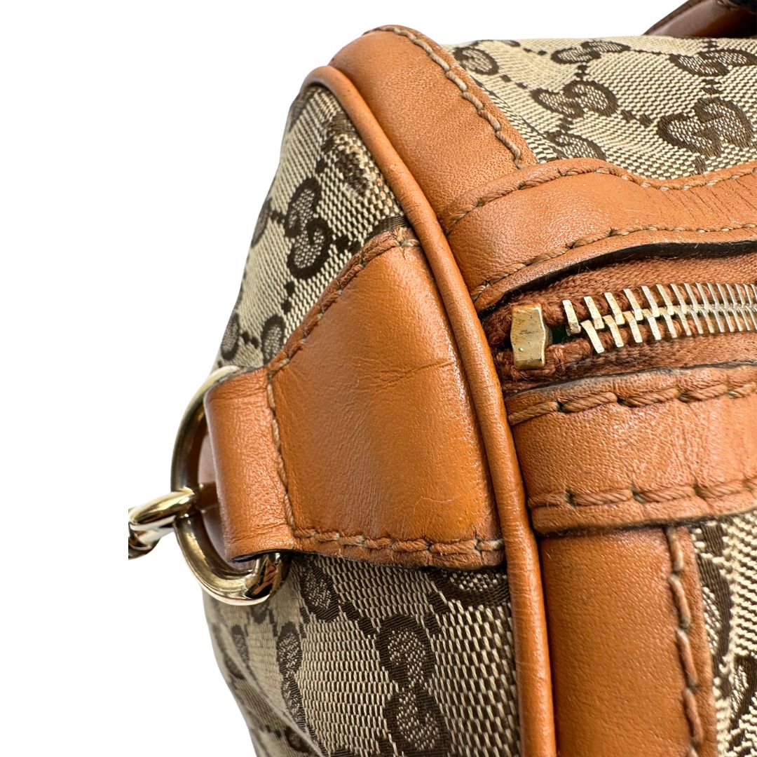 Bauletto Gucci Boston trama GG, impreziosito da striscia Web verde e rossa, di lusso, originale, discrete condizioni, usato