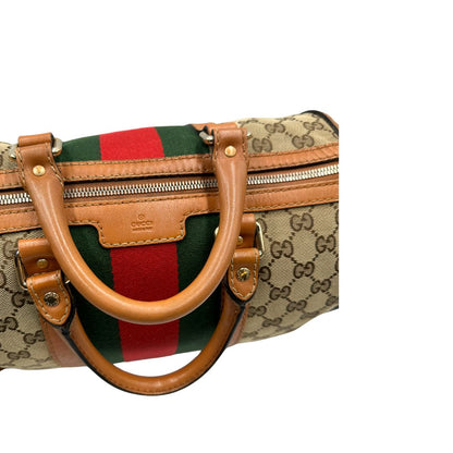 Bauletto Gucci Boston trama GG, impreziosito da striscia Web verde e rossa, di lusso, originale, discrete condizioni, usato