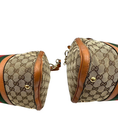 Bauletto Gucci Boston trama GG, impreziosito da striscia Web verde e rossa, di lusso, originale, discrete condizioni, usato